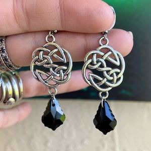 Celtic knot dangly earrings with black austrian crystals . Stainless steel posts